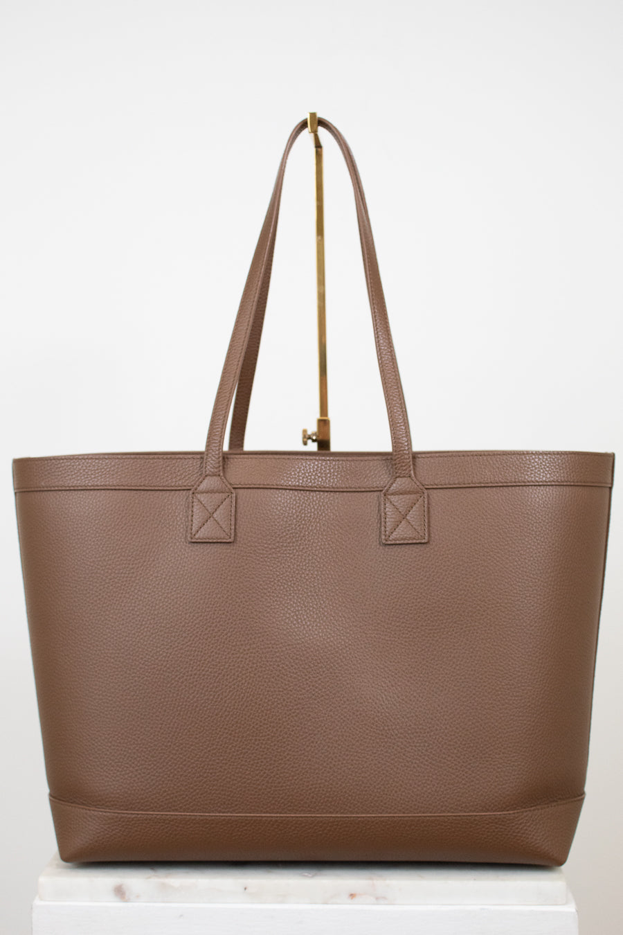 Brown tote bag on a white background
