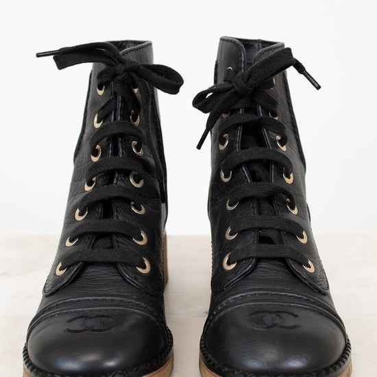 Lace up boots on white background