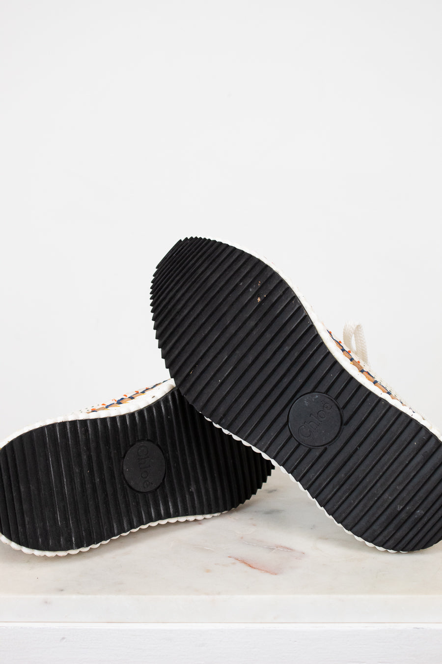 Black rubber sole of a shoe on a white background