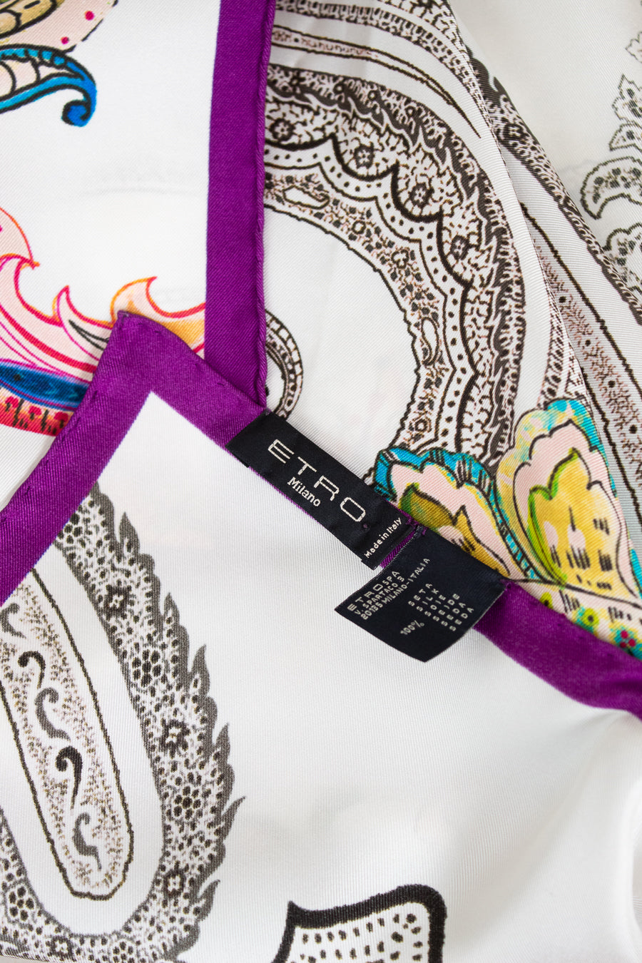 Close-up of a patterned fabric with a visible Etro label.