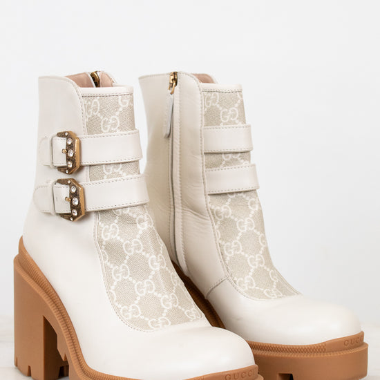 Gucci platform cream boots with gum sole on white background