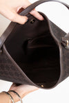 Interior of brown purse on white background