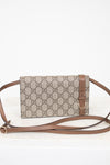 Gucci brown monogram crossbody on white background