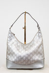 Silver Gucci handbag on a white background