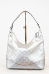 Silver Gucci handbag on a white background