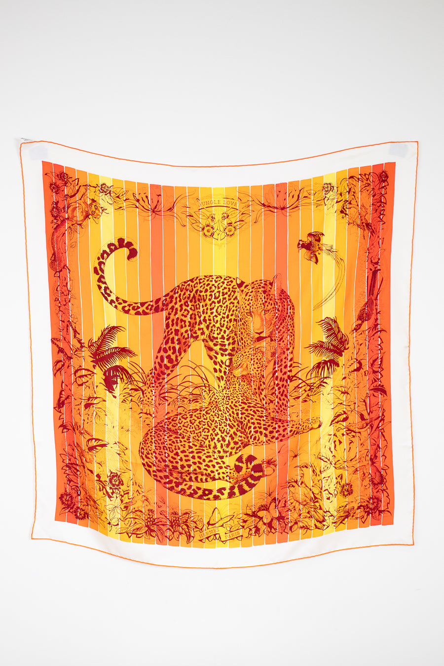 Leopard print fabric with orange and yellow gradient on a white background