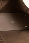 Beige leather bag interior showing Louis Vuitton logo and 'Made in France' text.