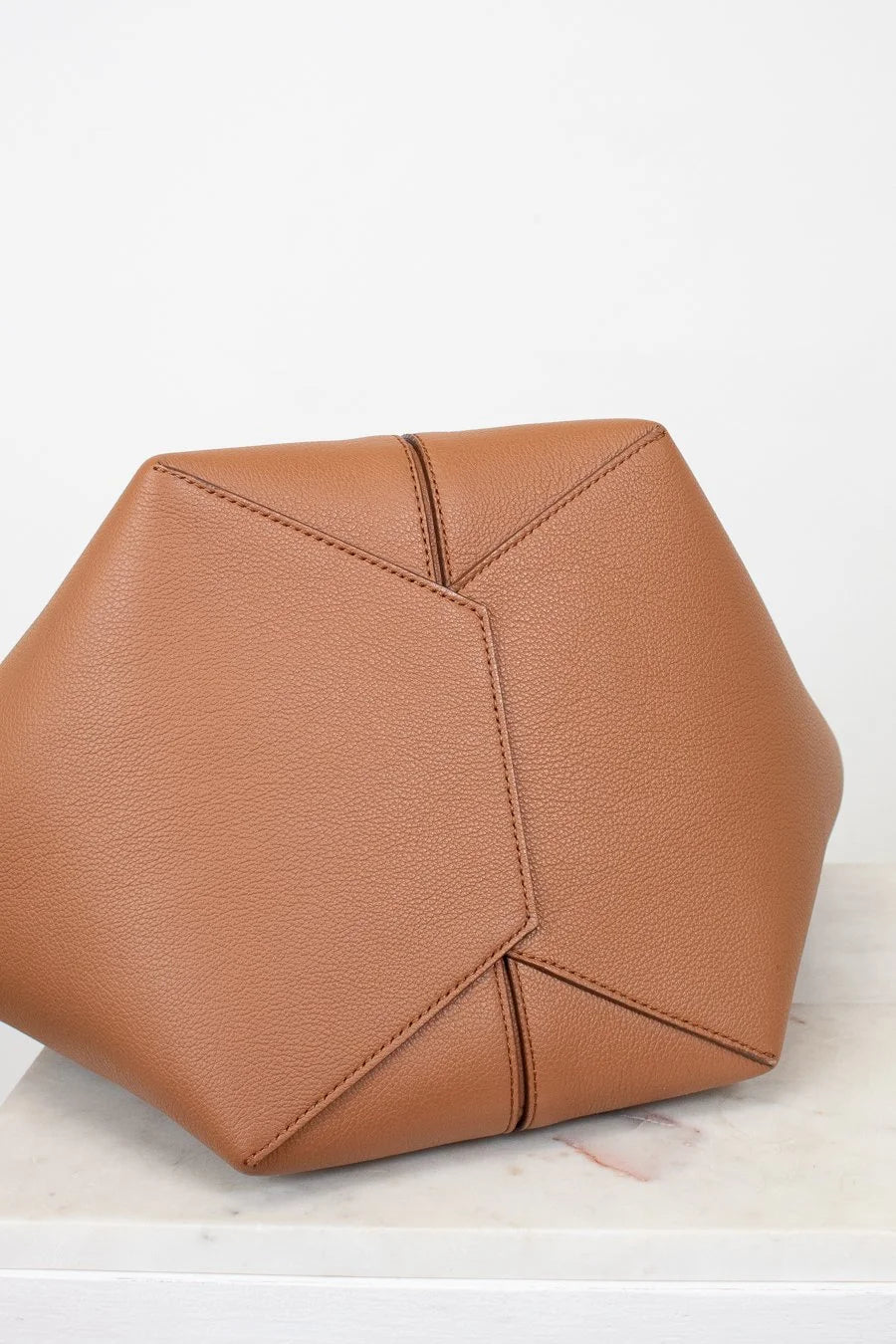 Brown geometric bottom of bag on a white background