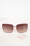 Sunglasses with a gradient lens on a white background