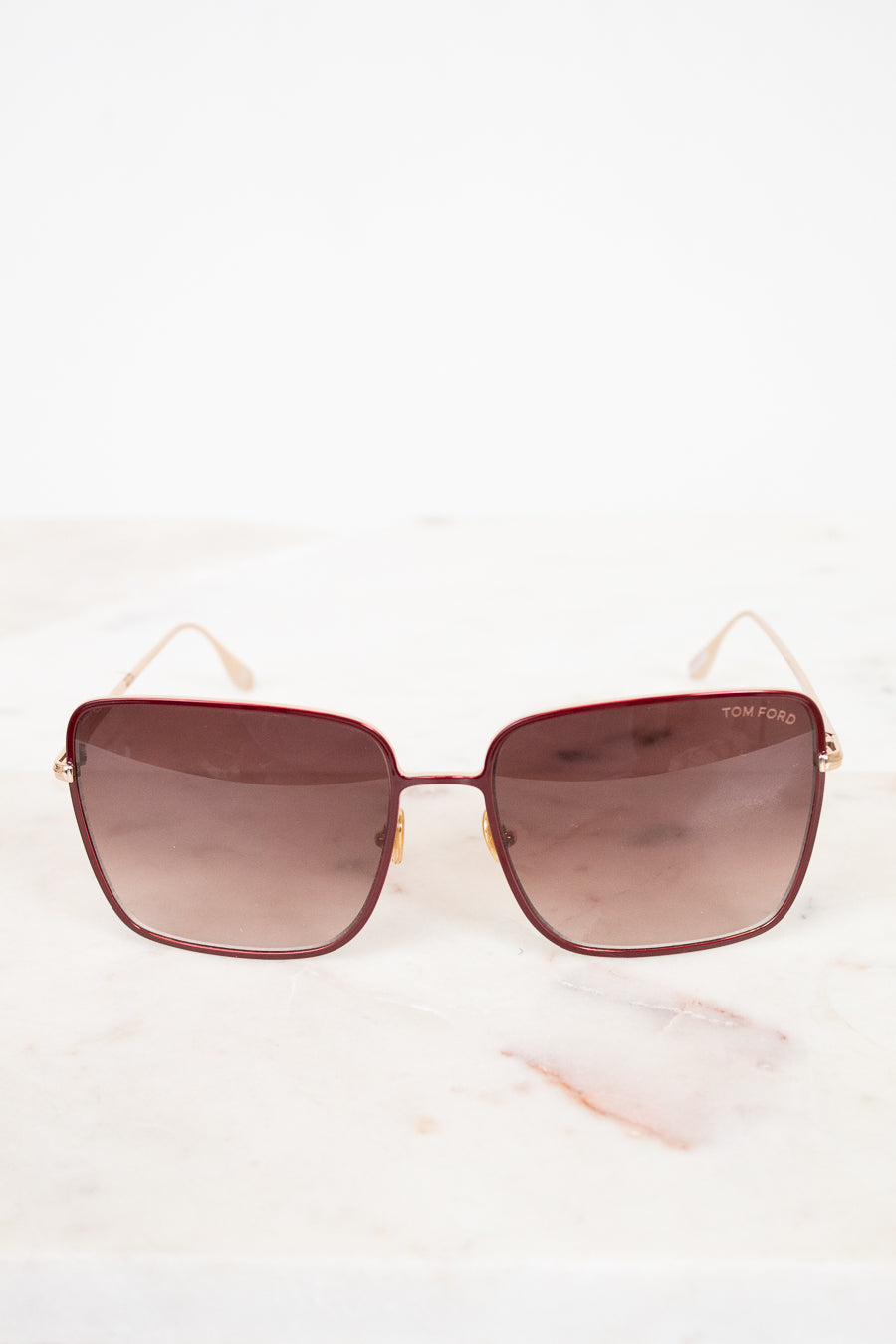 Sunglasses with a gradient lens on a white background