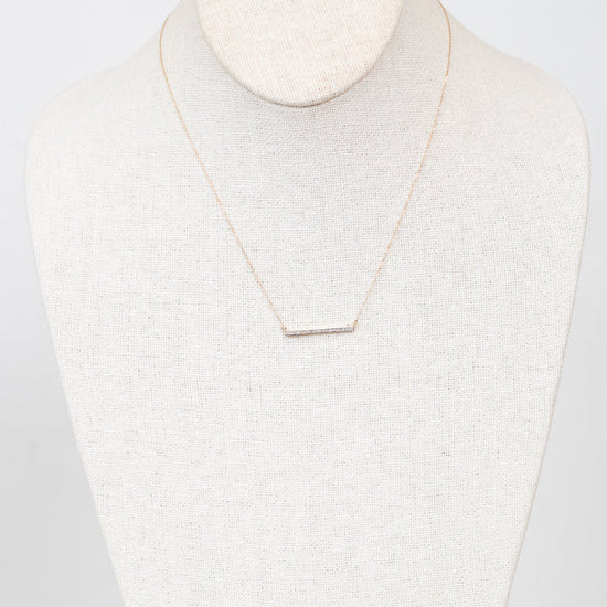 Dainty gold chain with diamond bar detail
