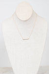 Dainty gold chain with diamond bar detail