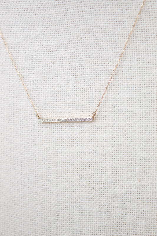 Dainty gold chain with diamond bar detail