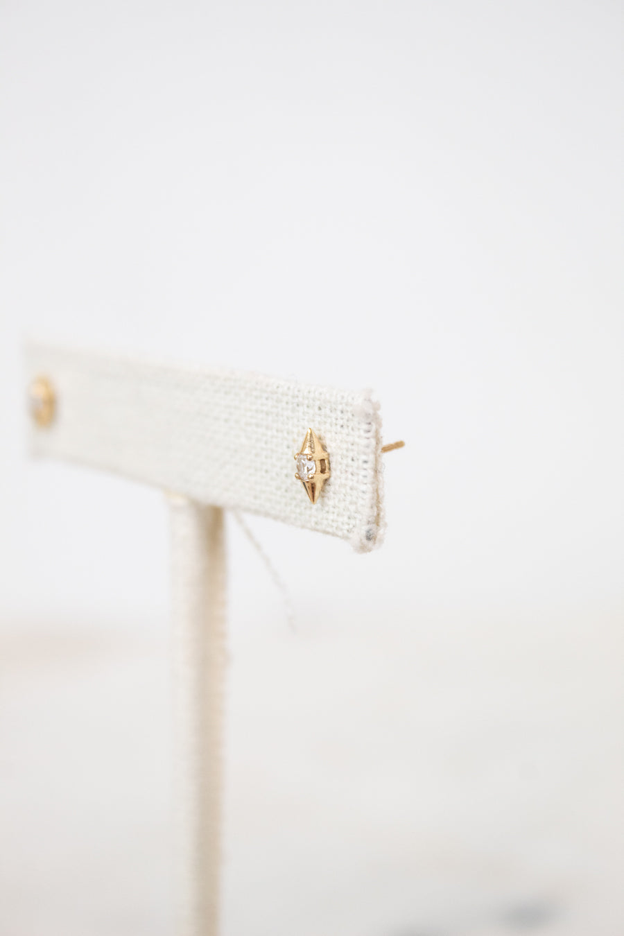 Gold with center diamond stud earrings