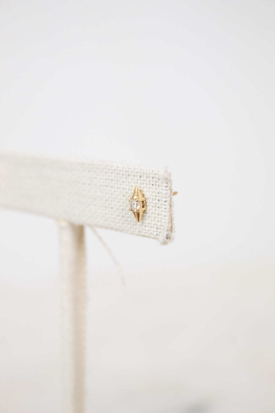 Gold with center diamond stud earrings