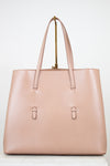 Beige leather tote on white background