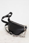 Black handbag with silver chain detail on a white background
