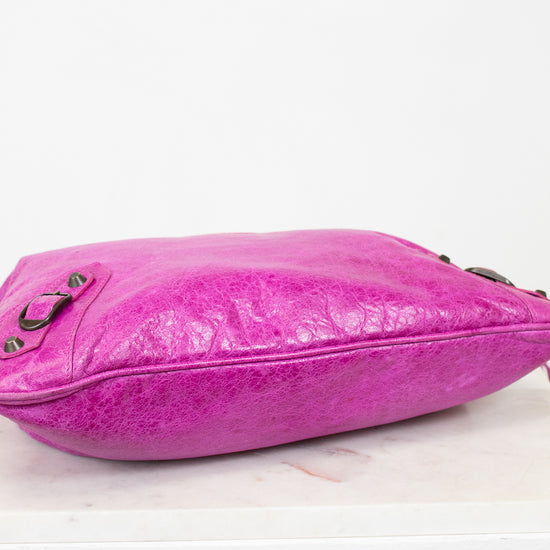 Pink handbag on a white background