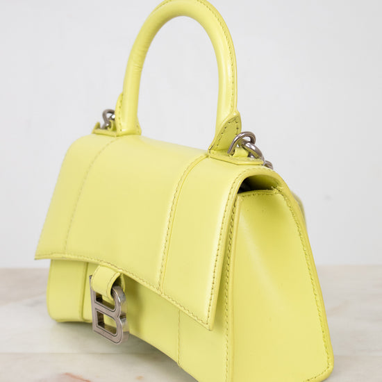 Yellow handbag on a light gray background