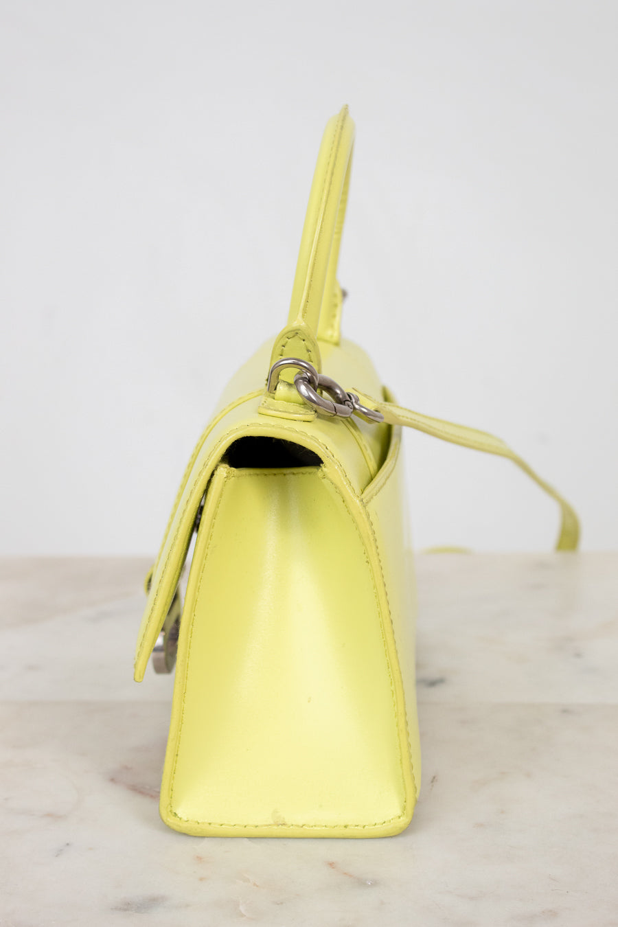 Yellow handbag on a light gray background