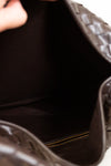 Close-up of a brown textured bag interior
