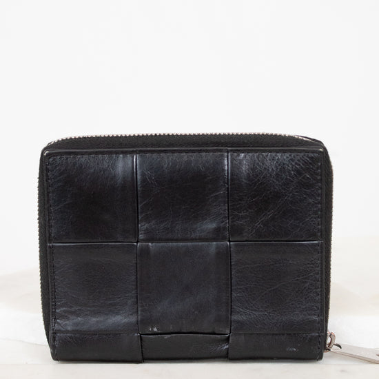Black leather wallet on a white background