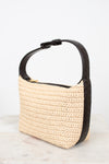Beige woven handbag with black handle on a light gray background