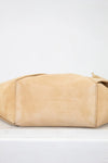 Beige handbag on a white background