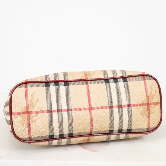 Bottom view of check patterned Burberry bag on white background