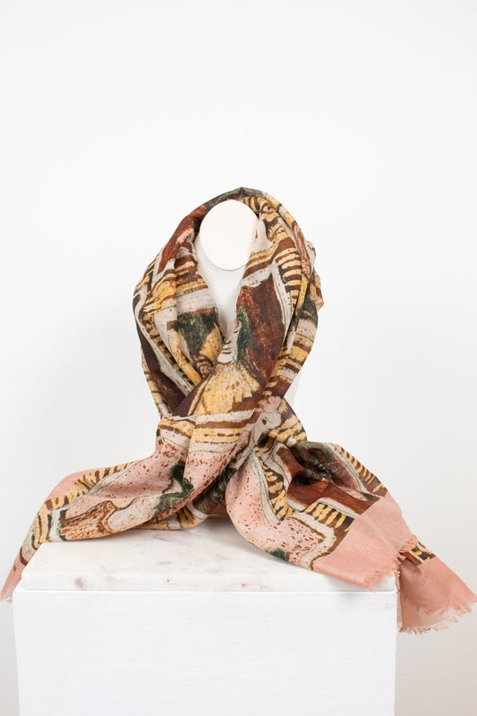 Photo of light material with neutral tone abstract patterns displayed on a bust 