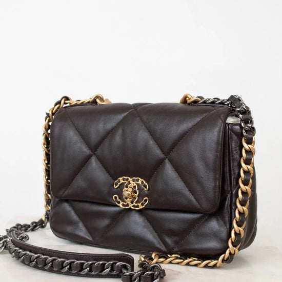 Dark Brown quilted handbag with gold chain strap on a white background