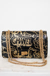 Chanel handbag with gold chain on a white background