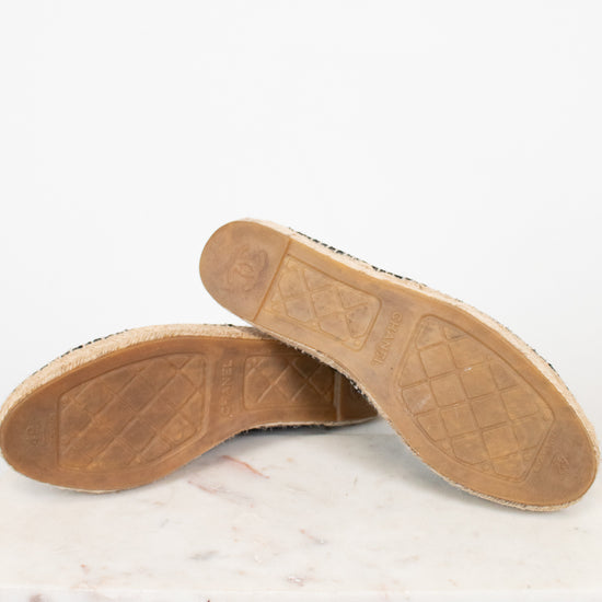 Close-up of shoe bottom soles on a light background
