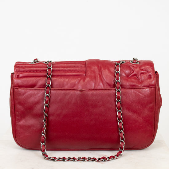 Red leather handbag with a chain strap on a white background