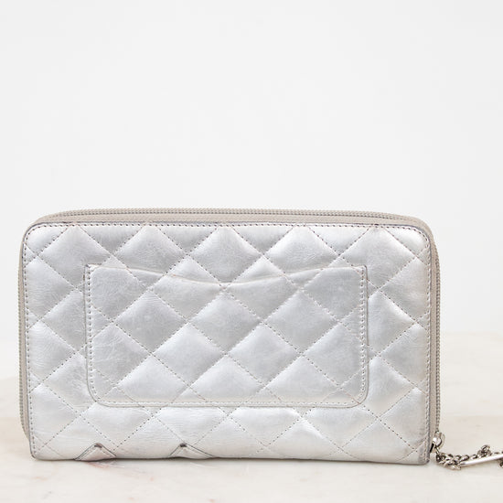 Quilted silver wallet on a white background