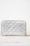Quilted silver wallet on a white background