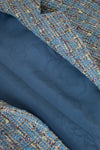 Close-up of blue fabric with a textured pattern