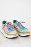 Colorful crochet sneakers on a white background