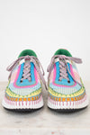 Colorful crochet sneakers on a white background