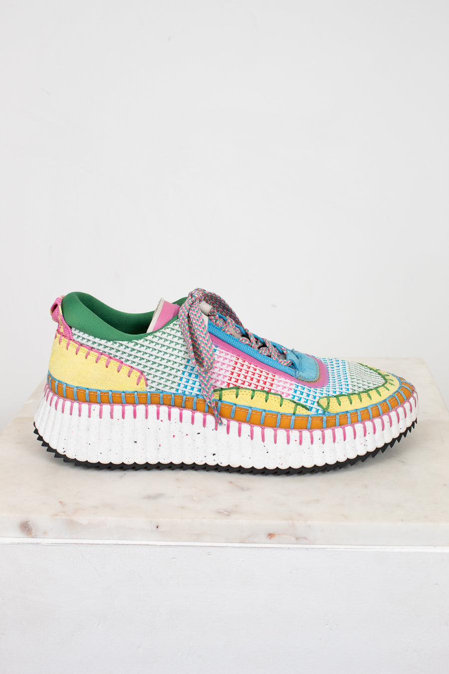 Colorful sneaker with a pattern on a white background