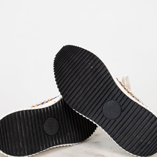 Black rubber sole of a shoe on a white background