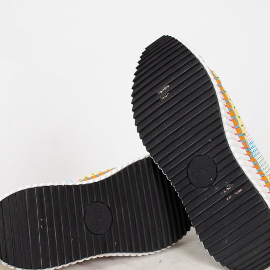 Close-up of black sole shoes on a white background