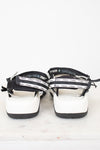 Back view of black and white 'Chloe' sandals