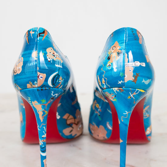 Blue high-heeled shoes with cartoon character design on a white background