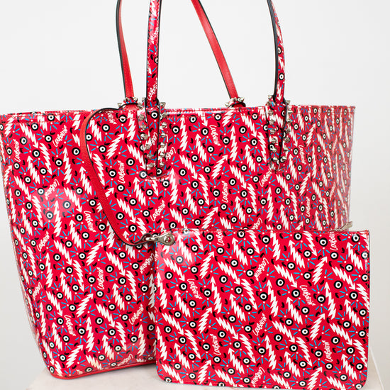 Red and white patterned tote bag with matching pouch on a white background