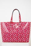 Red patterned tote bag on a white background