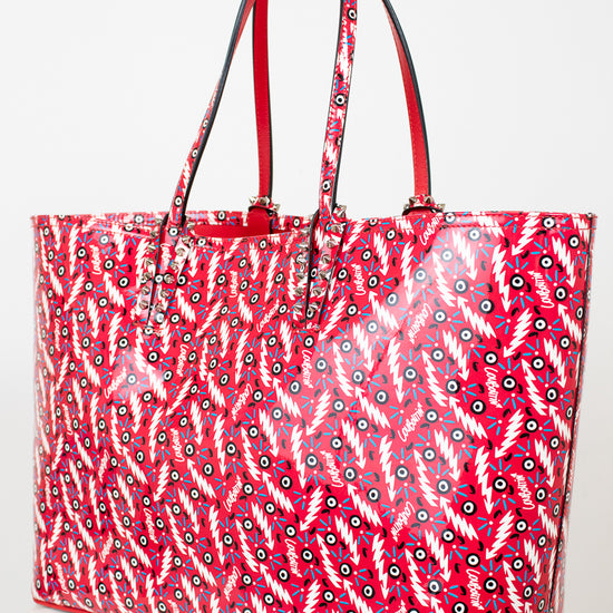 Red patterned tote bag on a white background