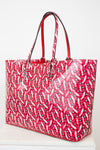 Red patterned tote bag on a white background