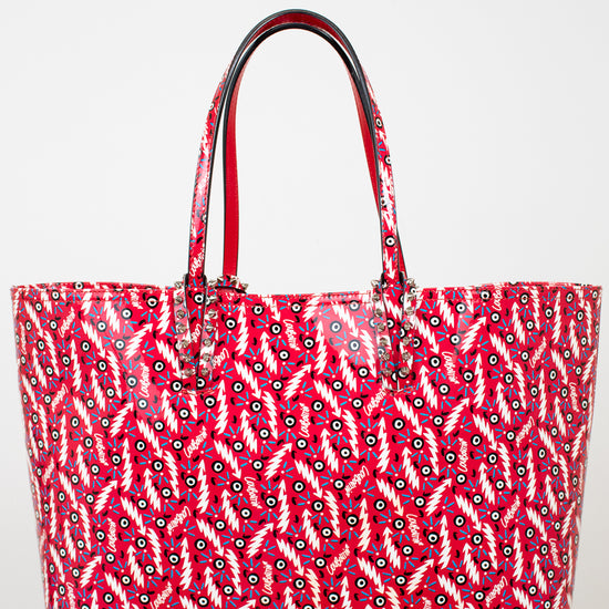 Red tote bag with white pattern on a white background
