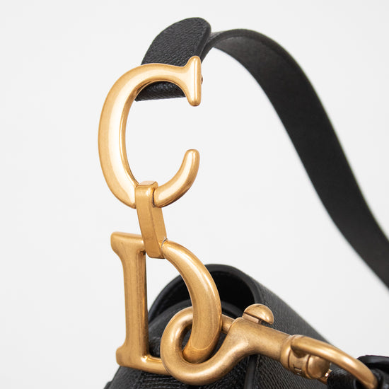 Close-up of 'CD' logo hardware